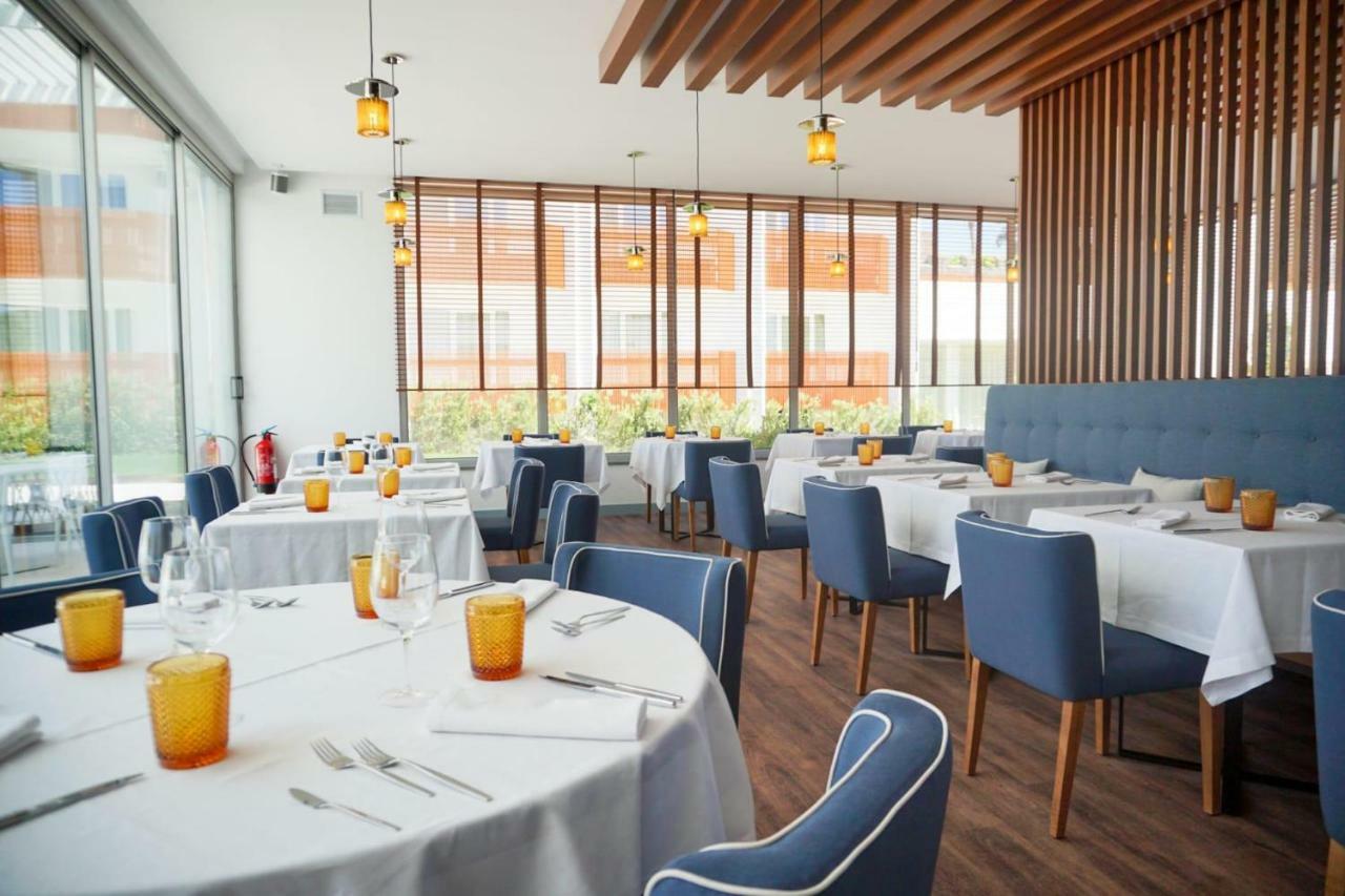 Malibu Foz Hotel - La Maison Younan Фигейра-да-Фош Экстерьер фото Restaurant