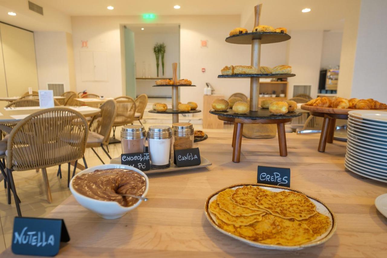 Malibu Foz Hotel - La Maison Younan Фигейра-да-Фош Экстерьер фото Breakfast at the hotel