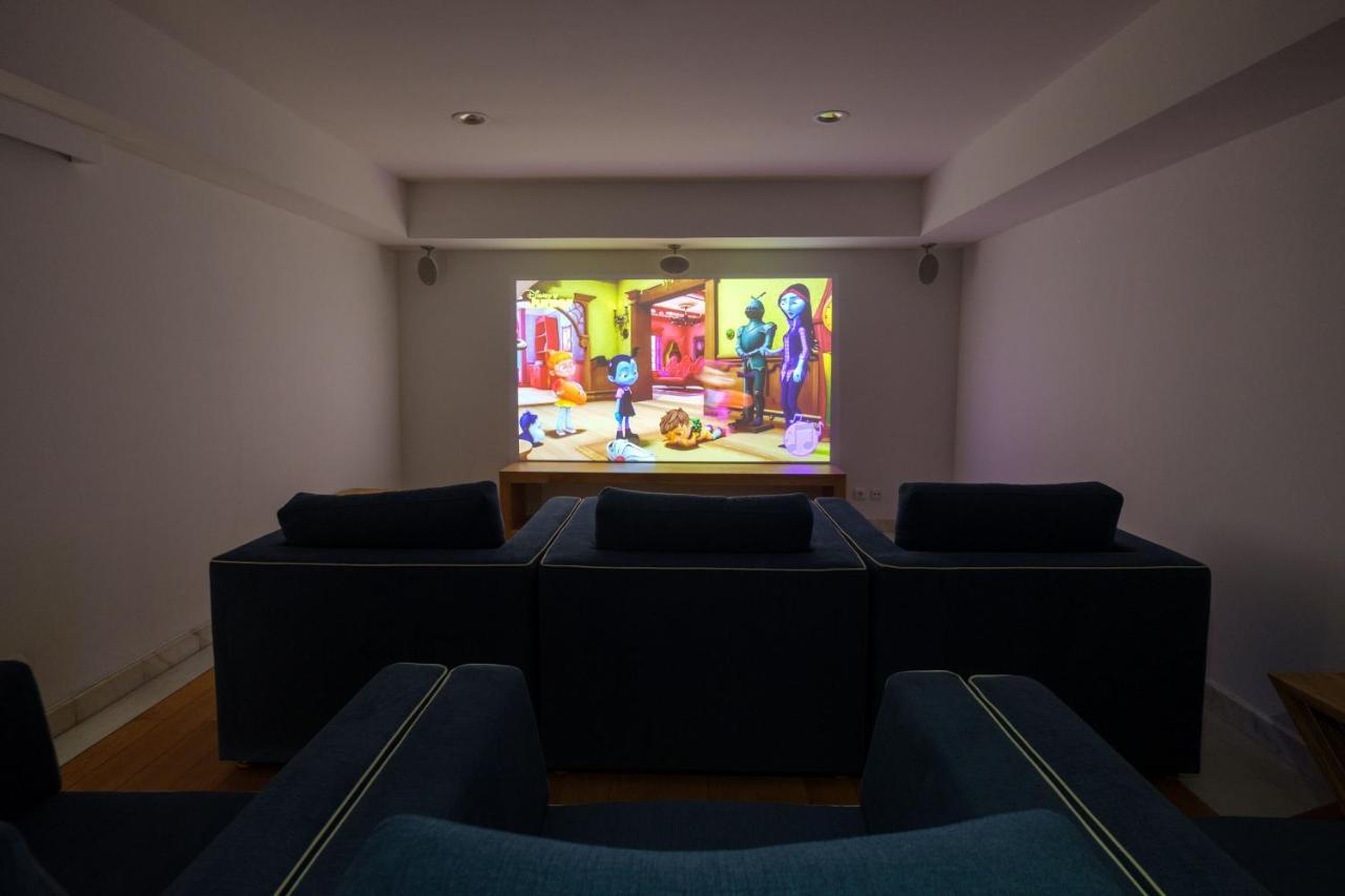 Malibu Foz Hotel - La Maison Younan Фигейра-да-Фош Экстерьер фото A home theater